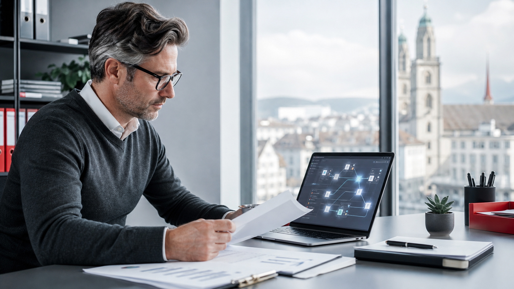 Laptop mit digitalem Dashboard auf einem Arbeitstisch